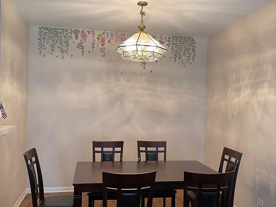 dining room furnished with table and six dining chairs