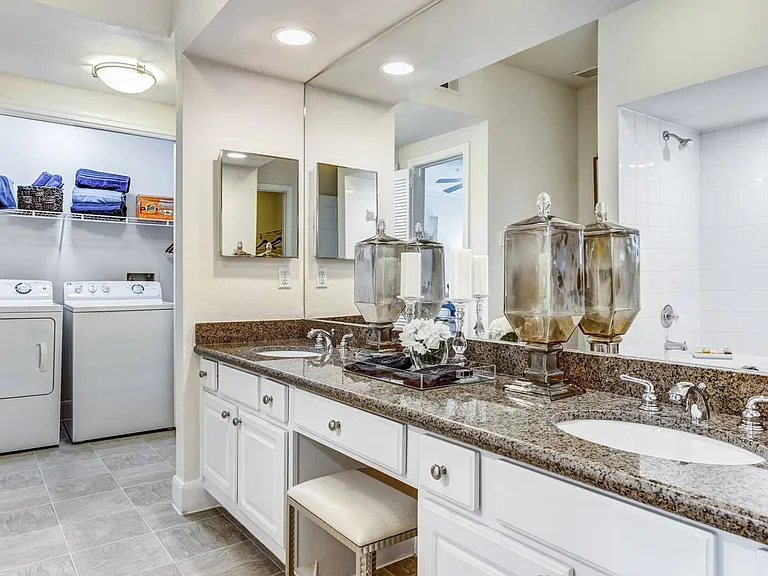 Spacious Primary Bathroom with Full-Sized Washer & Dryer
