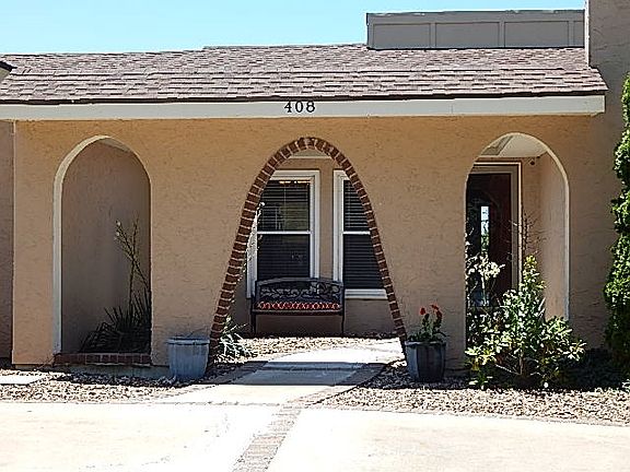 Pretty courtyard enhances this Spanish flair.