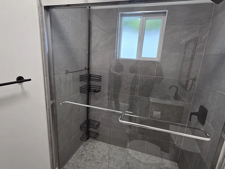 Shower with shampoo rack for convenience