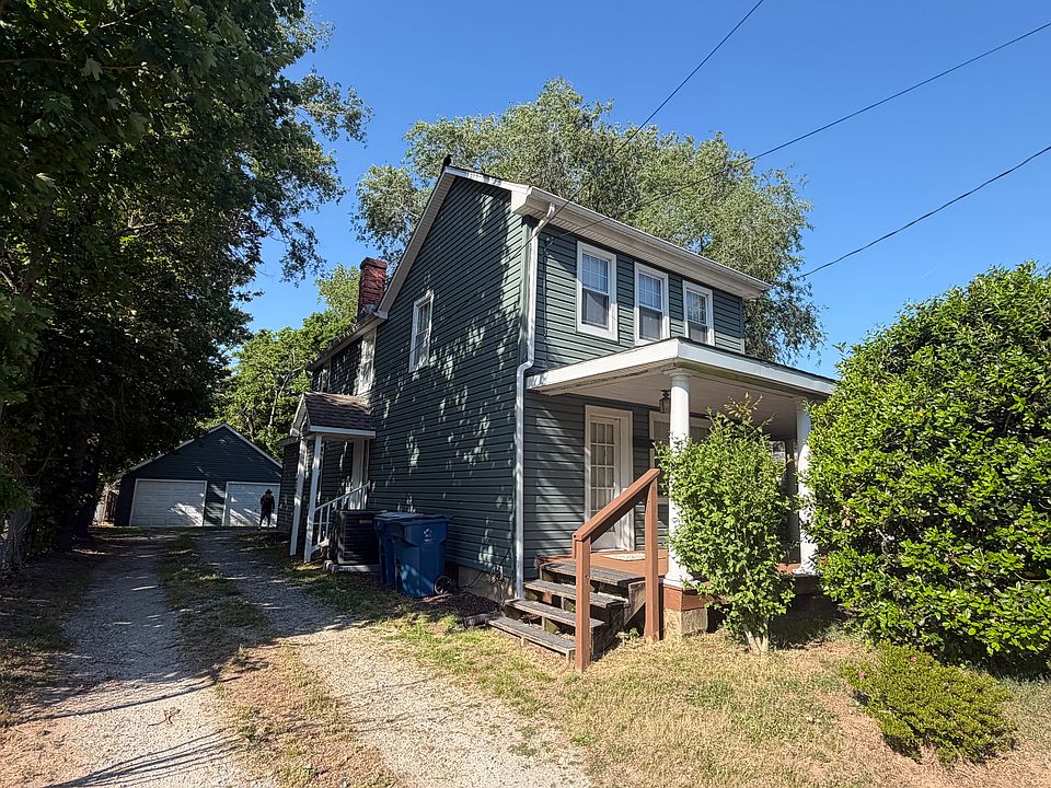 Side view of house with driveway