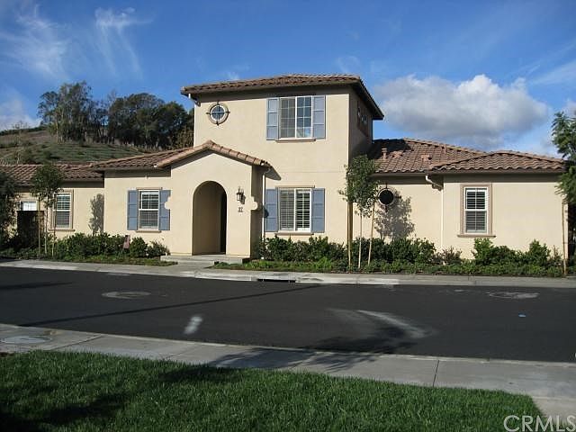 Spanish-modern bungalow style detached condo in the new 55+ community of "The Bungalows - Gavilan". 