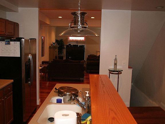 View of Kitchen Living/Dining Room/Entrance to Basement (from breakfast room)