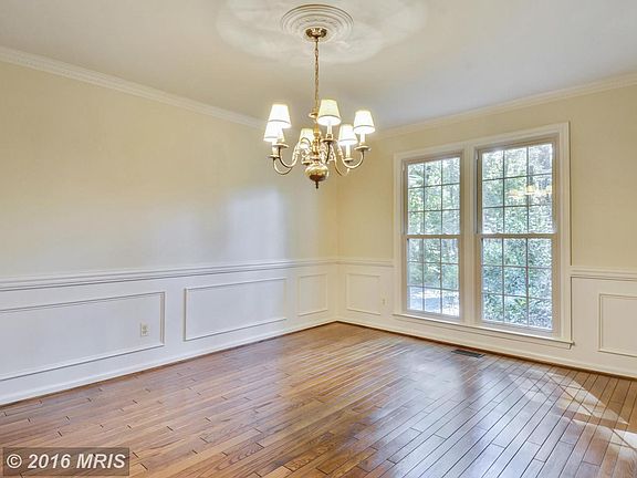 The large dining room connects to the kitchen