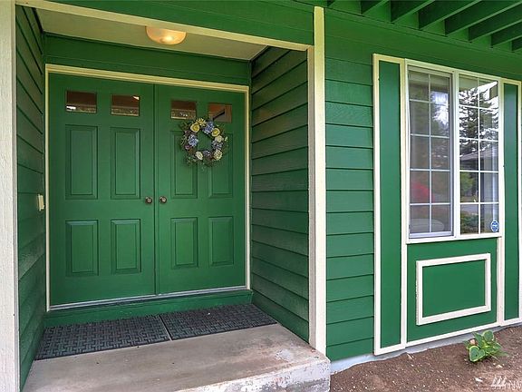 Guests are welcomed by this gracious covered porch.  Fairwood Greens is at the heart of the Fairwood community with sought-after