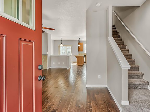 Welcome home. Brand new carpet, scraped hardwood floors.