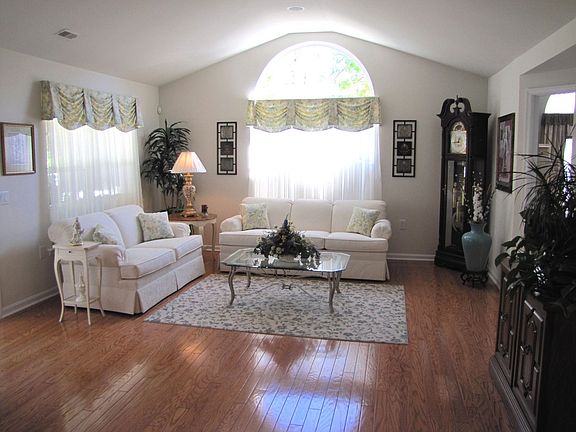 Living rom w/Palladium window & HW floors