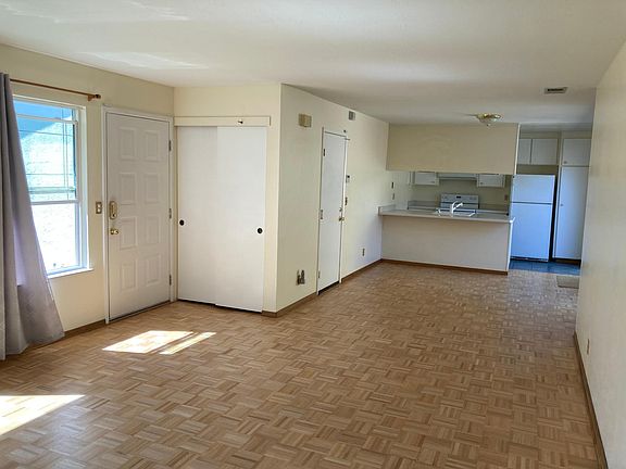 The living room, dining area and kitchen.