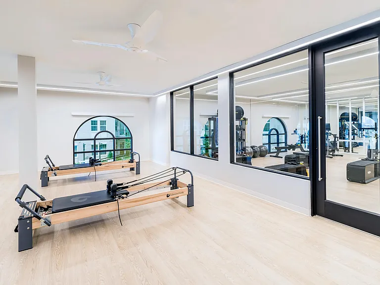 Find your balance and strength at Modera Waugh's dedicated Pilates studio, featuring top-of-the-line reformer machines.