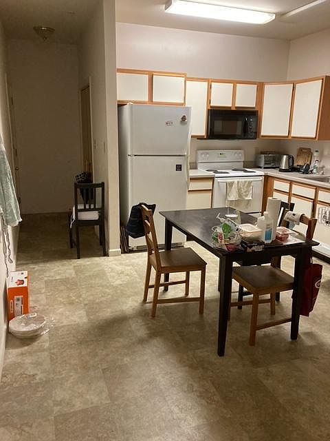 Refrigerator, stove, built in microwave, dishwasher disposal, panty and lots of cabinet space