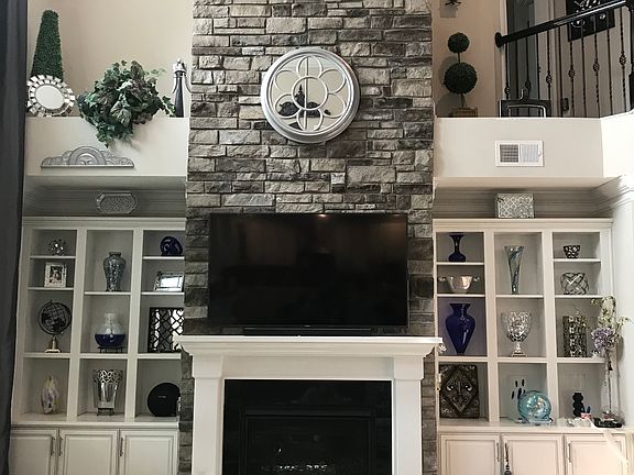 Floor to ceiling stone fp