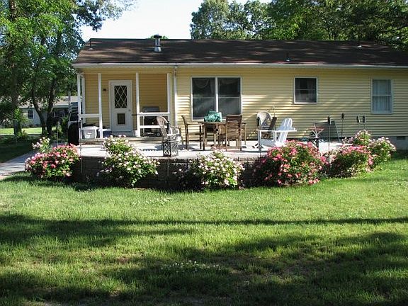 Rear of house and view of patio
