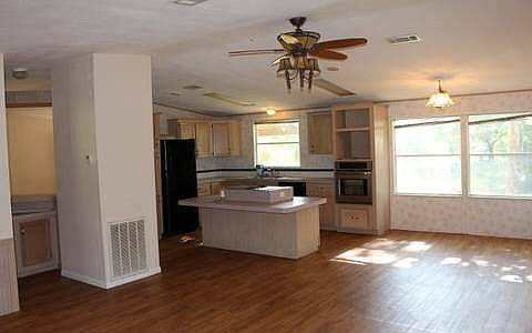 4th image of 676 SE Rolling Hills Dr