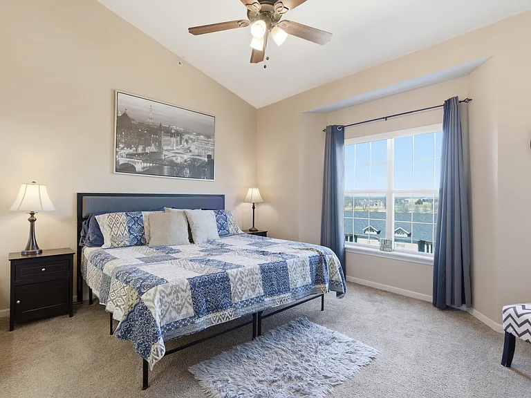 Fully furnished master bedroom with smart tv