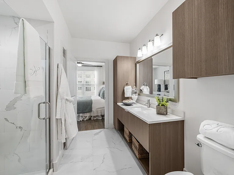 Spa-inspired bathroom with frameless showers in select homes