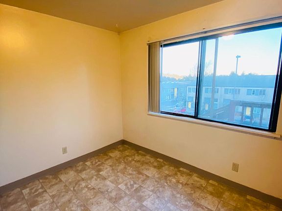 Dining area with mountain view out the window.