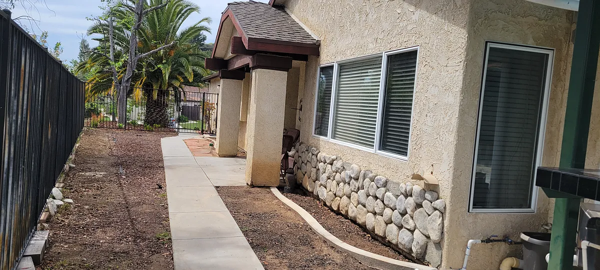 Private entrance looking from pool area - 6828 Chapman Pl