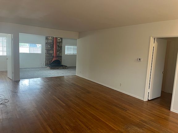 View of Living Room and Bonus Family Room from Kitchen entry way.