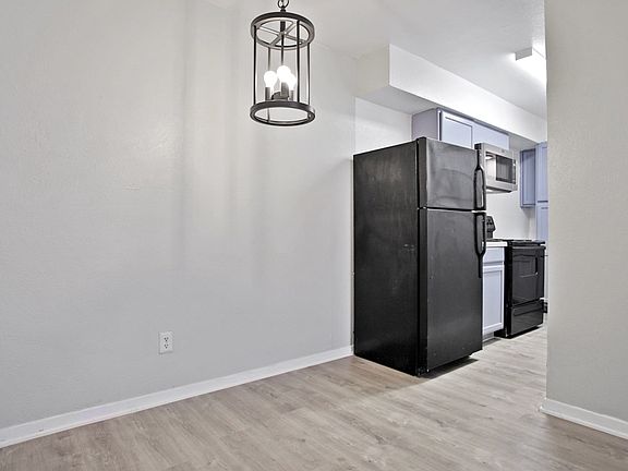Modern kitchen with updated lighting and open layout