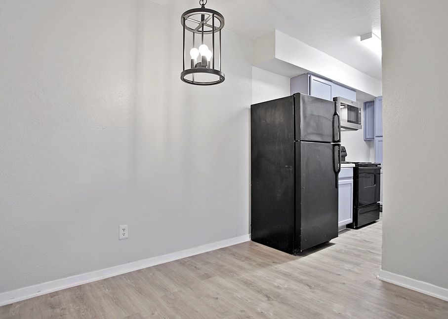 Modern kitchen with updated lighting and open layout