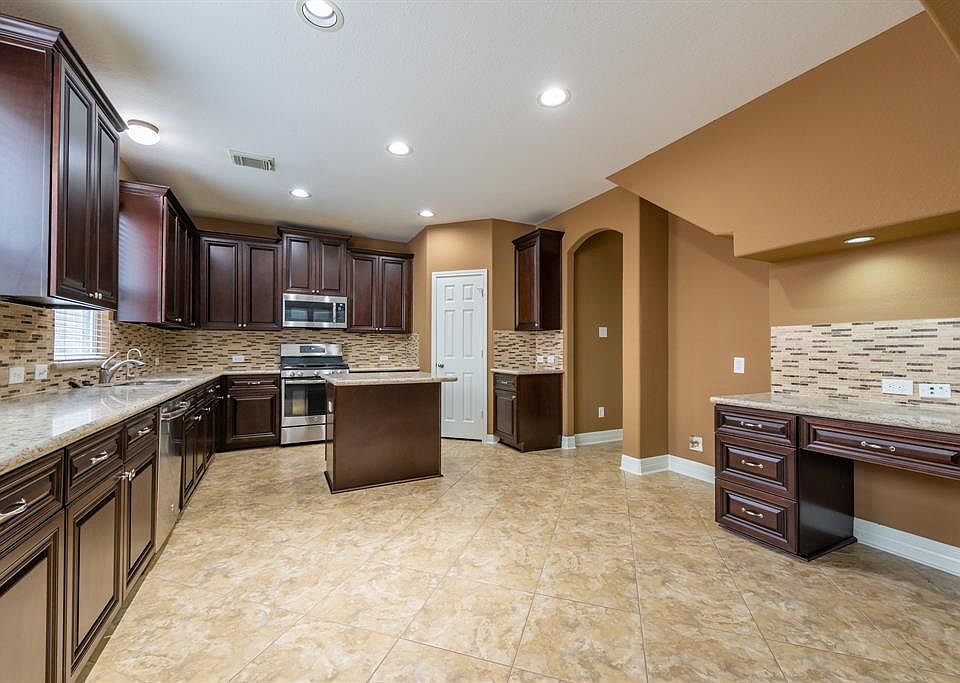 This remodeled home boasts a FABULOUS kitchen where the owners spared no expense...