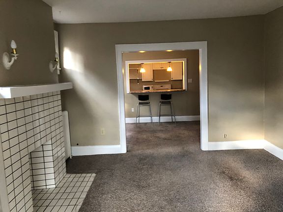 Faux fireplace & bookshelves