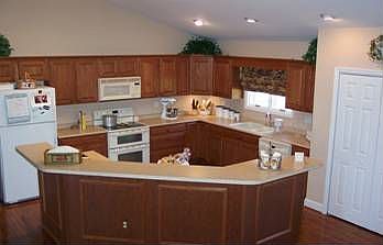 Kitchen w/ eat around bar