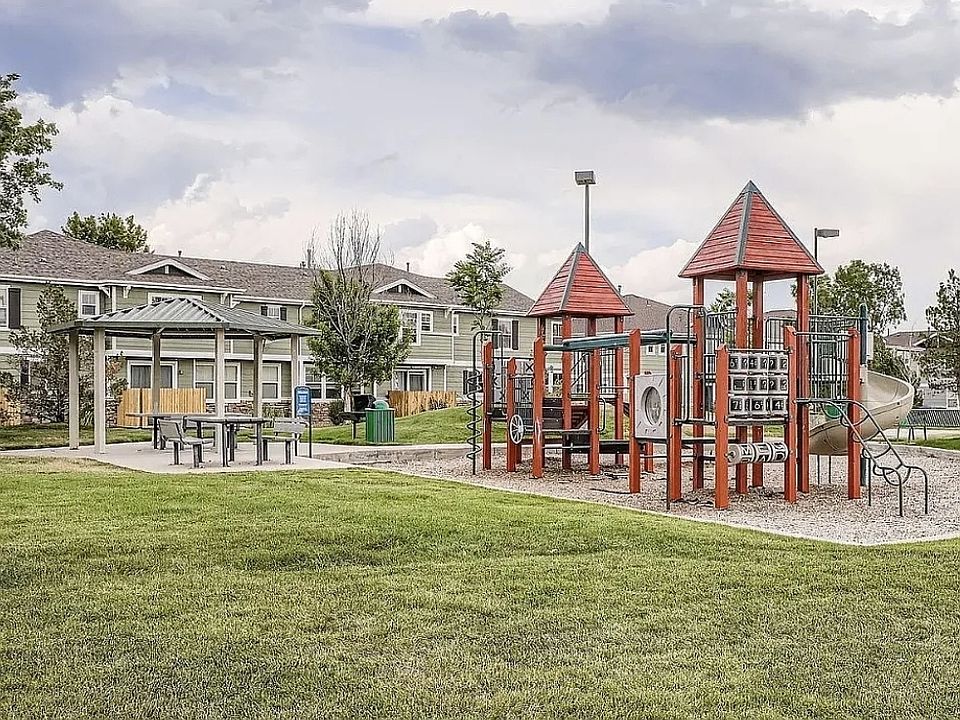 private playground, open field, equipment and volleyball court owned by Condo associatoin
