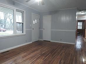 Large Living area with hardwood floors