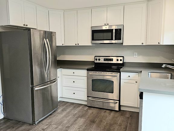 Kitchen with stainless steel appliances.