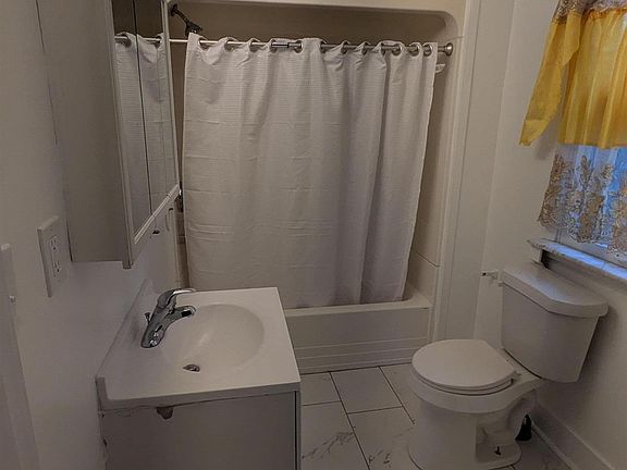 4th image of 8708 Jewett Ave