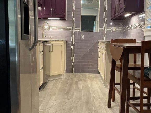 Double door Fridge, Tile floor, Metal ceiling