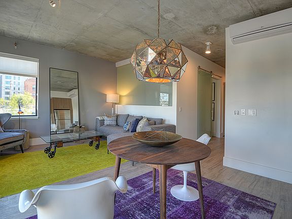 Luxe living room and dining area with plenty of natural light