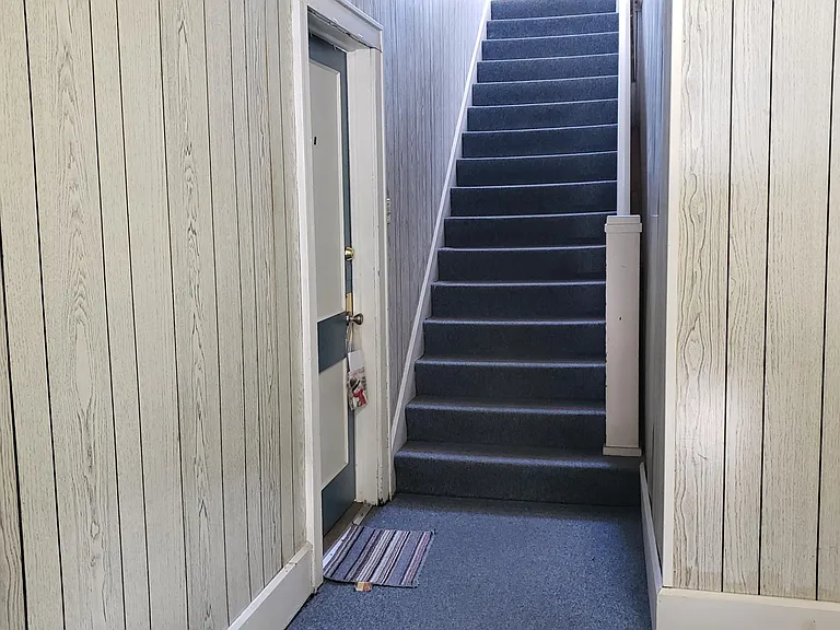 inner foyer, stairway to Apt. C