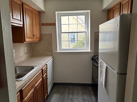 Kitchen with new electric stove.