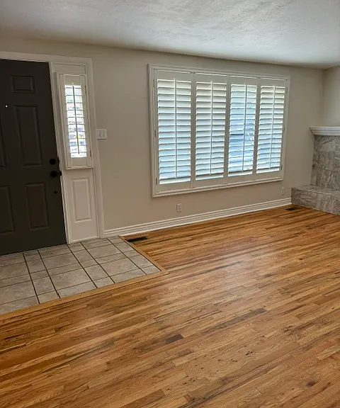 Front door view from kitchen and hallway