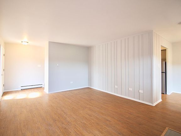 Main living area, dining room and kitchen to the right