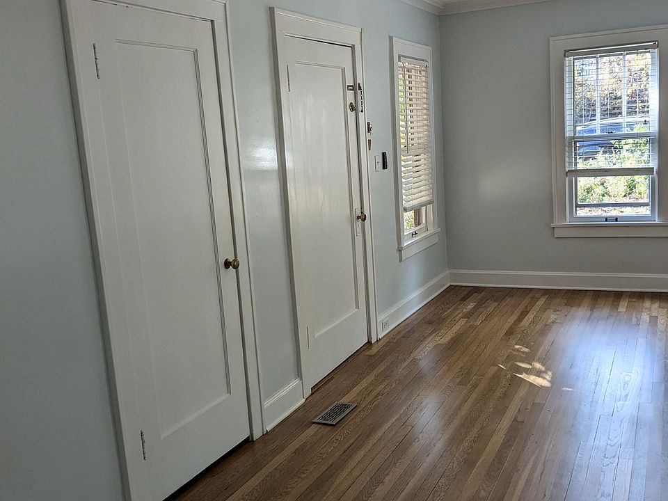 Front door from hall and large closet door