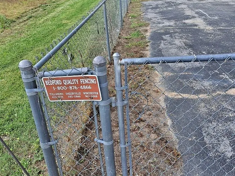 Chain linked fenced backyard