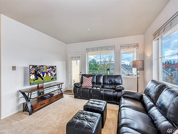 The Living Room Includes Walk-Out Access To The Expansive Deck.