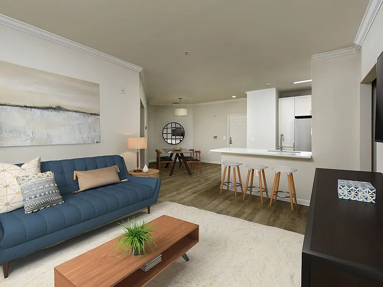 Renovated II kitchen, living, and dining areas with hard surface flooring