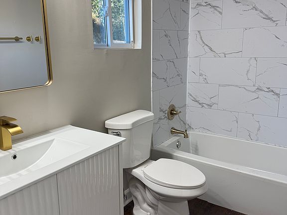 Master bathroom with gold fixtures