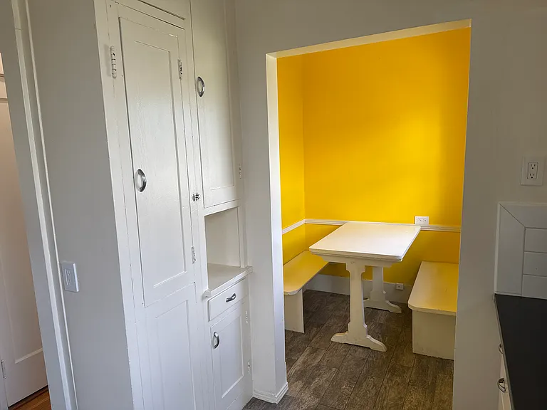 Breakfast nook and kitchen storage (painted since photo)