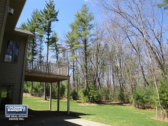 VIEW OF THE 9+ WOODED ACRES