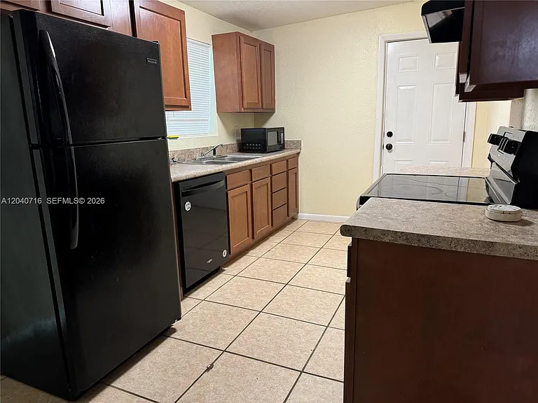 9410 Gilchrist Ct — Photo 4