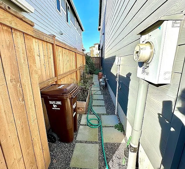 View from side yard entry door - Located back side of the house