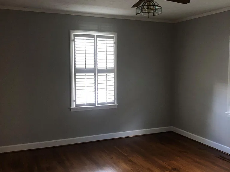 bedroom 1 with new real hardwood flooring