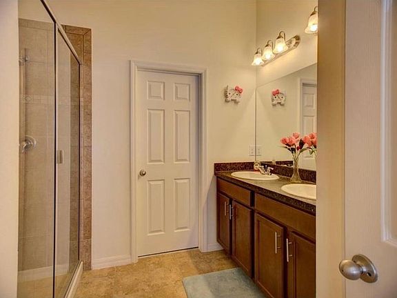 Master bedroom bathroom with walk in closet
