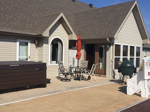 back patio with hot tub