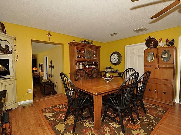 This view shows the dining area. Notice the low maintenance floors.